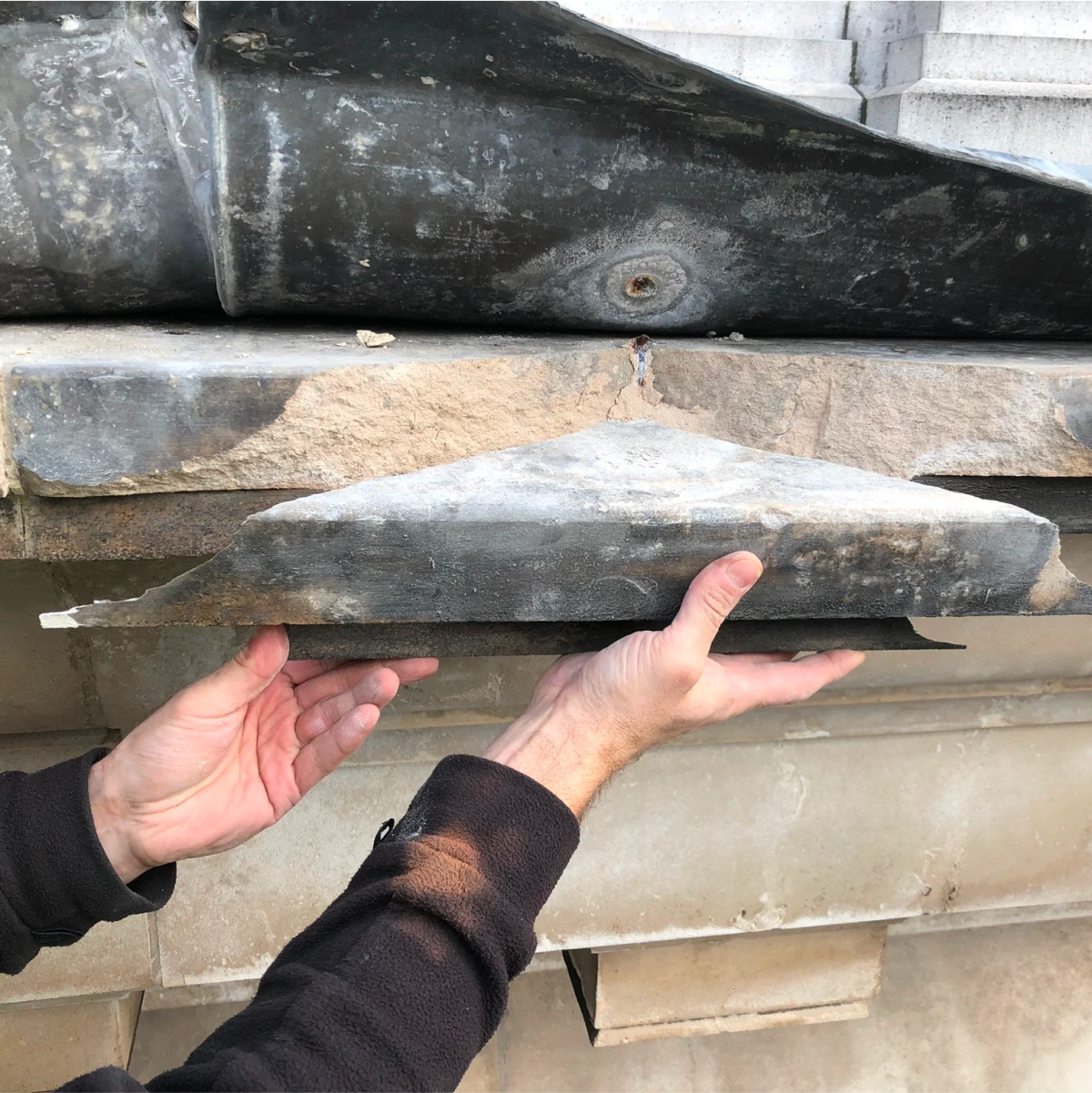 Portland Stone: Cornice fractured due to corrosion of an iron bolt.