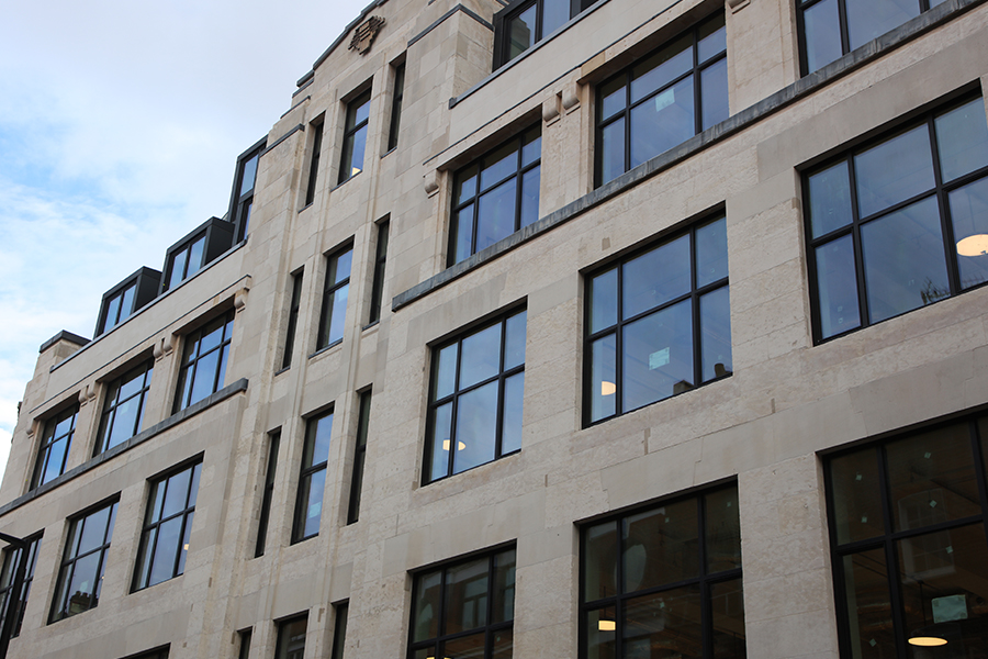 An image of the fully cleaned Portland stone façade of 142 Waldour Street, otherwise known as Film House.